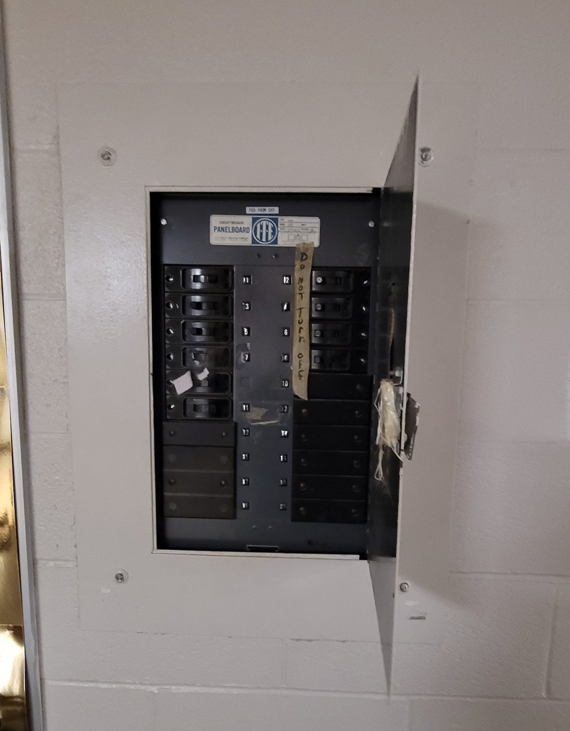The campus library at Royal Junior High no longer has working light switches. Instead, librarians must flip three circuit breakers in this panel in order to turn lights on or off. The library, as well as the rest of the campus, also is lacking in electrical outlets needed in the digital age.